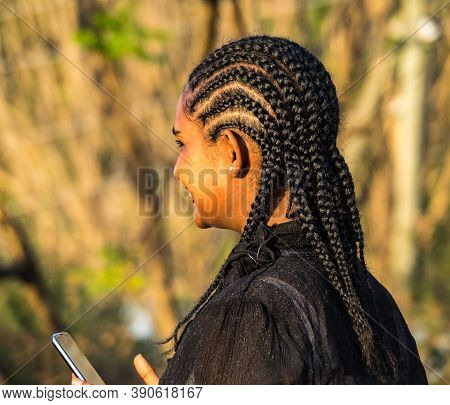 Gondar, Ethiopia - Feb 09, 2020: Ethiopian Girl On The Roads Of Gondar In Ethiopia, Africa. Traditio