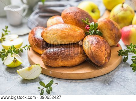 Ready-made Baked Pies (pirogi) With Apple. Traditional Russian Cuisine.