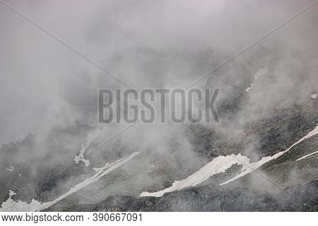 Aerial View Of Mountainscape Below Lac De Moiry In The Swiss Alps. Ch Switzerland.