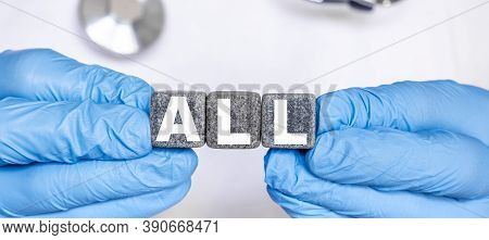 All Acute Lymphoblastic Leukemia - Word From Stone Blocks With Letters Holding By A Doctors Hands In