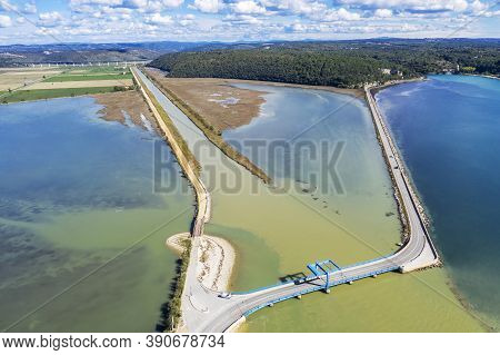 The Mouth Of A River Mirna Into The Adriatic Sea, In The Background A Bridge Over Mirna River, Anten