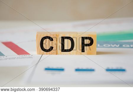There Is A Piece Of Paper With A Printed Schedule On The Table, The Word Is Written On The Wooden Cu