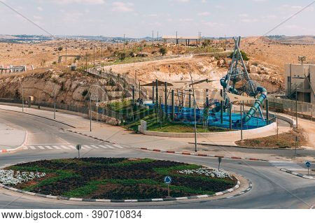 Rosh Haayin / Israel - October 4 2020: View Of Playground And Roundabout In Israel