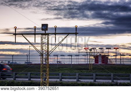 Dowsing Bird Scarers At The Airport Against The Backdrop Of A Beautiful Sunset.