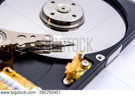 Internal Parts Of A Hard Disk Isolated On A White Background. Close Up Of Hard Disk Drive Inside Vie