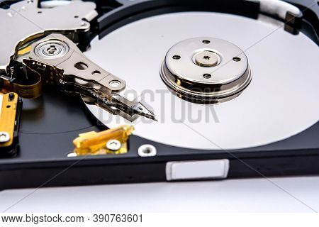 Internal Parts Of A Hard Disk Isolated On A White Background. Close Up Of Hard Disk Drive Inside Vie