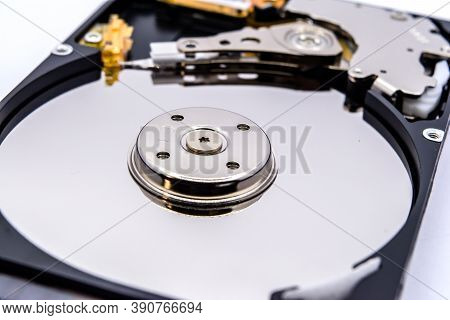 Internal Parts Of A Hard Disk Isolated On A White Background. Close Up Of Hard Disk Drive Inside Vie