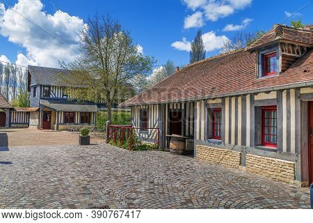 Street With Historical Half-timbered Houses In Beuvron-en-auge, France