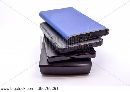 Hdd - Stack Of Portable Hard Disk Drives Isolated On White Background. Pile Of External Hard Disk Dr