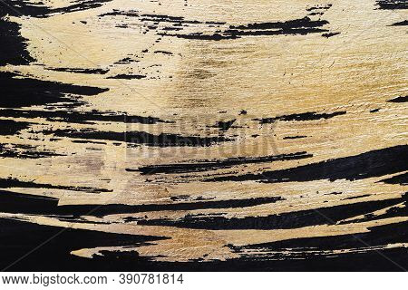 Gold Potal Background Or Texture. Abstract Shining Brush Strokes On Black
