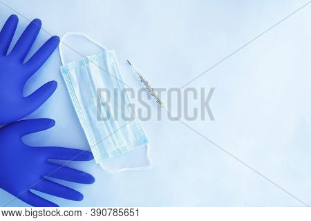 Flat Composition With Medical Gloves, Mask Pills On A White Background. Place For Text.