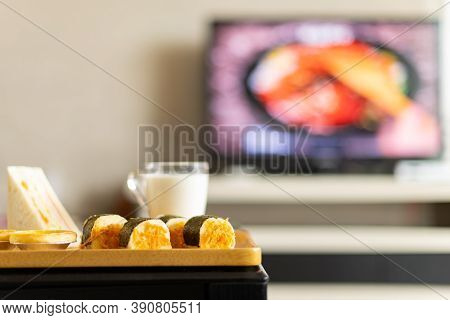 Healthy Breakfast In A Living Room With A Tv Broadcasting A Food Making Programme