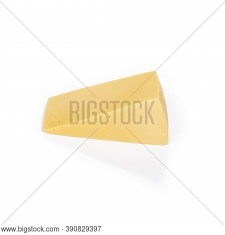 Shooting In The Studio. A Piece Of Yellow Cheese, Cut From The Head. Close-up. On White Background.