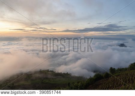 Aerial View Of Sunset Above Fluffy Sea Fog Misty Clouds With Mountain Hill From Phu Tub Berk, Khao K