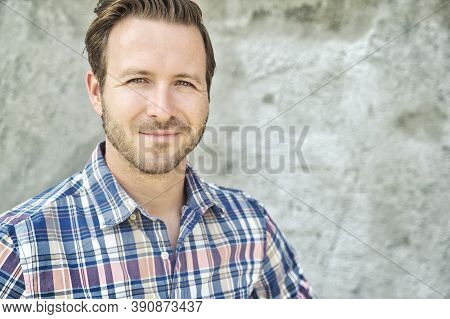 Portrait Of A Trendy Young Man In The City Concreate Background