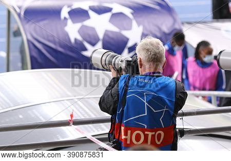 Kyiv, Ukraine - September 29, 2020: Football Photographer On Tribune Platform At Work During The Uef