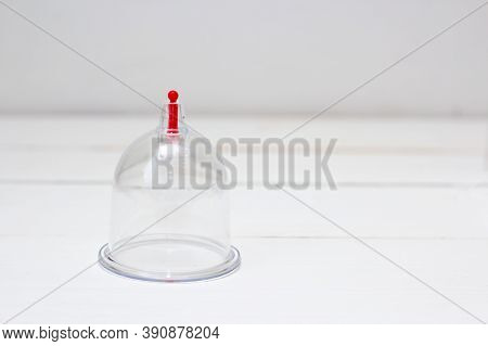 One Hijama Jar On White Wooden. Bloodletting. Sunnah Treatment. Islam.