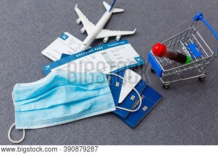 Coronavirus And Travel Concept. The Concept Of Restrictions For Tourism. Passport, Thermomether And 