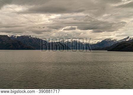Sarmiento Channel, Chile - December 11, 2008: Amalia Glacier And Fjord. Wide Shot On Snow On Mountai