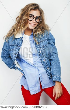 Young Pretty Blond Teenage Hipster Girl In Glasses Posing Emotional Happy Smiling, Gesturing Isolate