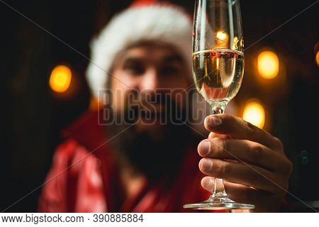 Champagne In Hands Festive Happy Men. Santa Claus Wishes Merry Christmas And Happy New Year. Santa I