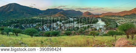 Epupa Falls Full Of Water On The Kunene River, Northern Namibia And Angola Border. Sunrise African L