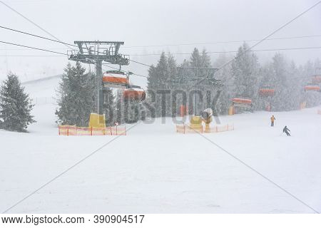 Chair Lift On Ski Slope At Slotwiny Arena Ski Station At Snowstorm, Krynica Zdroj, Poland