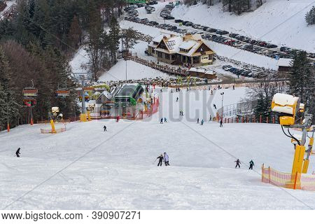 Krynca Zdroj, Poland - January 28, 2020: Skiers Go Down The Slope At Slotwiny Arena Ski Station At S