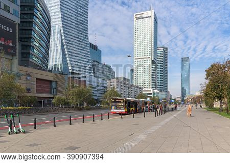 Warsaw, Poland - October 19, 2019: People Take The Bus On Emilia Plater Street Amongst Skyscrapers I