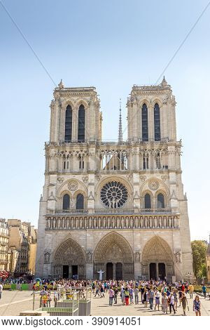 Paris, France - 9 September, 2012: People Walking In Front Of The Our Lady Of Paris (notre Dame Cath
