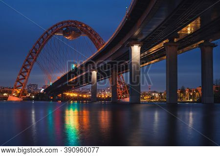 View Of Zhivopisny Bridge In Moscow, Russian Federation. Photo Shoot Of The Red Arch, Steel Cable-st