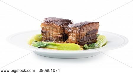 Isolated Dong Po Rou (dongpo Pork Meat) In A Beautiful Plate With Green Vegetable.