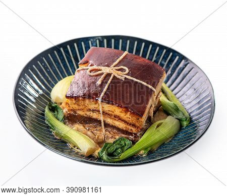 Isolated Dong Po Rou (dongpo Pork Meat) In A Beautiful Plate With Green Vegetable.