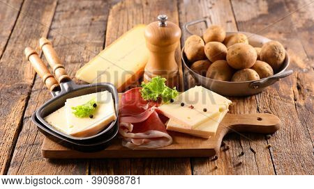 raclette cheese with meat and potato