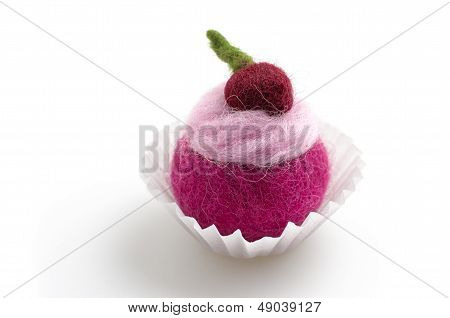 colorful felt praline on a white background