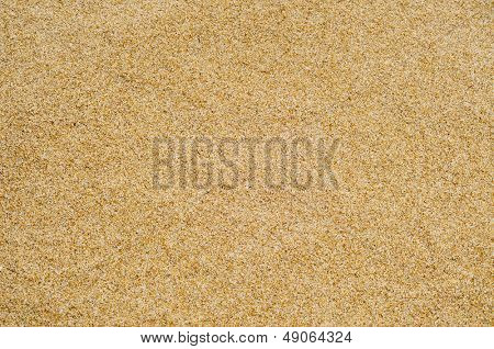 Nærbillede af en bunke sand på en strand eller en ørken eller en sandkasse
