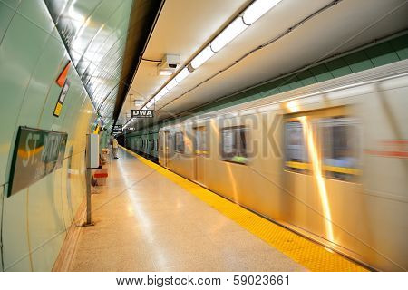 TORONTO, CANADA - JULY 3: Subway with passengers on July 3 in Toronto, Canada. 2012. Operated by Government of Ontario in Great Toronto, it carries over 217,000 passengers weekday and 57 M annually.