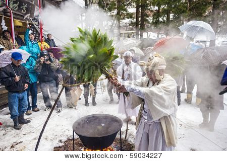 NAGANO, JAPAN - FEB 4, 2013: Shinto Ascetics perform ancient purifying rites. Known as Yamabushi, they are mountain hermits with a long tradition of mysticism.
