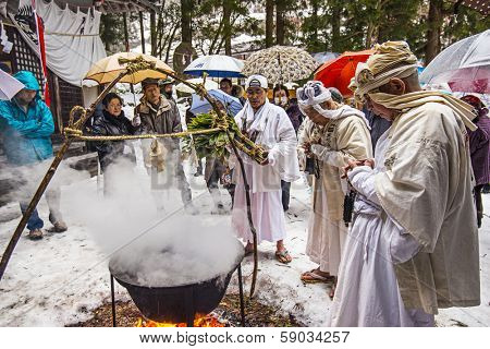 NAGANO, JAPAN - FEB 4, 2013: Shinto Ascetics perform ancient purifying rites. Known as Yamabushi, they are mountain hermits with a long tradition of mysticism.