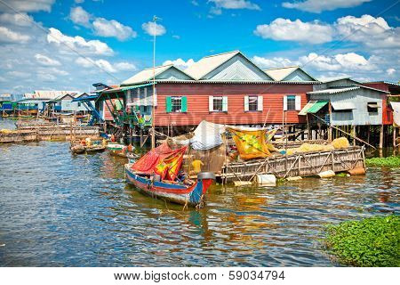 The floating village, caled Komprongpok, on the water of Tonle Sap lake. Cambodia.