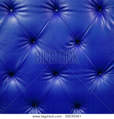 Close Up Blue Luxury Buttoned Black Leather