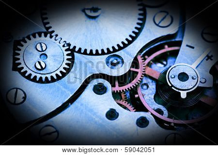 Clockwork details, pinions and wheels closeup