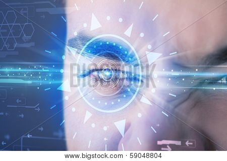 Modern cyber man with technolgy eye looking into blue iris