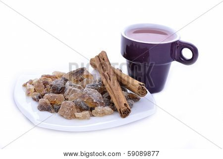 Tea, cinnamon and crystal sugar