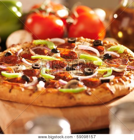 supreme italian pizza with pepperoni and toppings