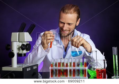 Crazy scientist working in laboratory