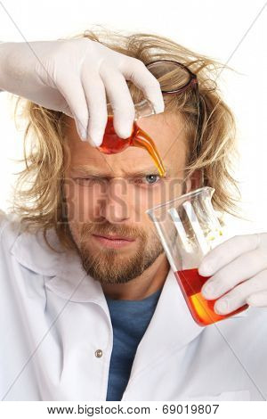 Crazy scientist working in laboratory