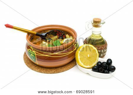 Dish Of Russian Hodgepodge Soup In Ceramic Pot On White Background