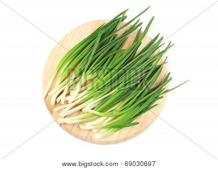 Fresh spring onion on platter.