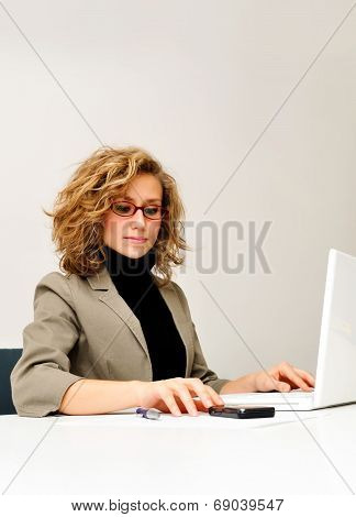 Businesswoman Is Working With Laptop